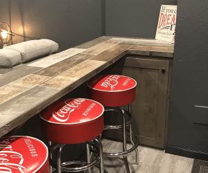 Bar seating area with coca-cola chairs
