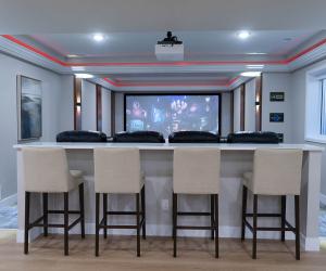 custom home theater with bar seating, 2021
