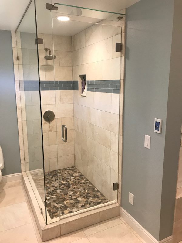 Basement Finishing Ideas - River Rock Shower Tile