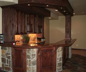 Basement Bar with Dark Wood & Stone