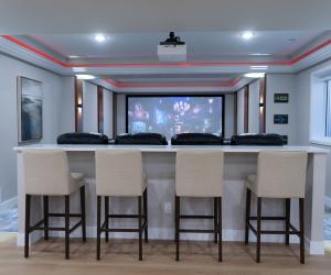 custom home theater with bar seating, 2021