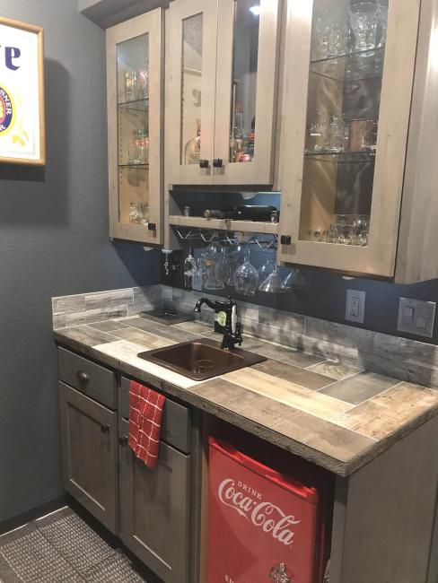 Basement bar with red coca-cola fridge